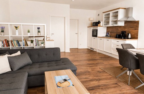 Lobstaedt Apartment | 120-square-meter vacation rental with lake views, dock right on the water/Sleeps 8, 3 bedrooms