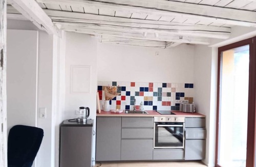 Gera Apartment | Beautiful one-room penthouse apartment with kitchen in Gera's city center
