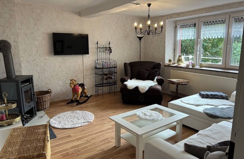 Saaleplatte Apartment | Cozy vacation apartment with pool and garden. Pets allowed, also for fitters