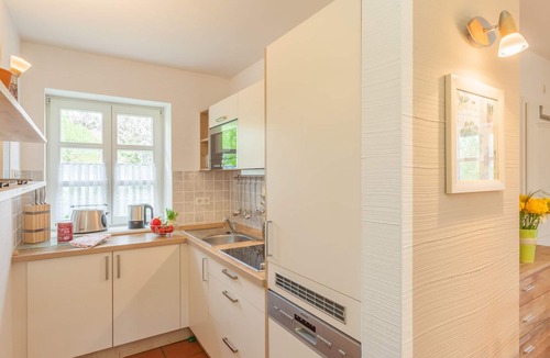 Kreptitz Apartment | quiet apartment near the beach on the ground floor + DG with garden incl. Indoor swimming pool /sauna etc.