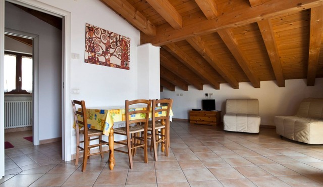 Dachgeschosswohnung mit Privatparkplatz by Interhome in Salionze