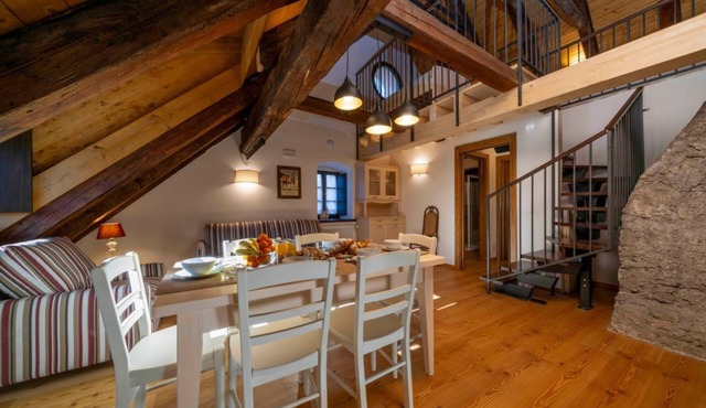 GuestHost - A comfortable 94 square meters apartment, perfect for seven people, located on the second floor of a historic building dating back to 1864 and renovated in 2025 while maintaining its historic atmosphere (NO elevator).The property is located o in Tarvisio