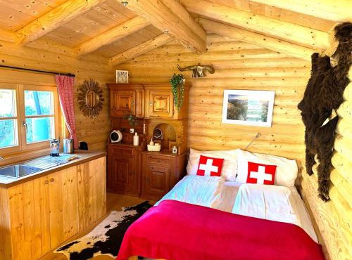 Idyllic Farm Cabin with Scenic Views and Concierge by SwissHut in Sigriswil
