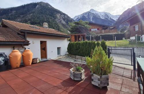Leuk Apartment | Apartment Chalet Haus - bei Einfahrt grosser Nussbaum by Interhome