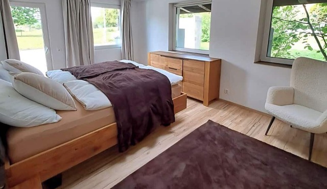 Apartment with big garden, two firepits and 5 minutes from the lake in Courtepin