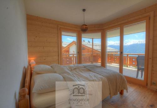 Ancolie 6 a Anzere pres du centre avec vue sur les Alpes in Anzère